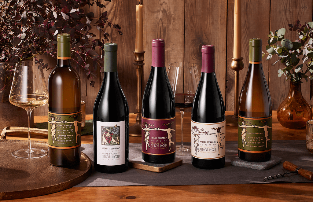 Wine bottles lined up on table